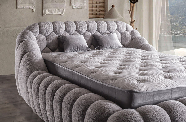 Letto Matrimoniale Graz in Tessuto Bouclé con Design a Coste