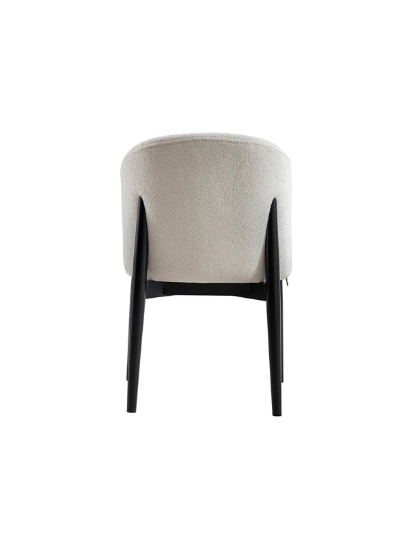 Sedia Side vista posteriore con gambe in legno nero che sostengono lo schienale
