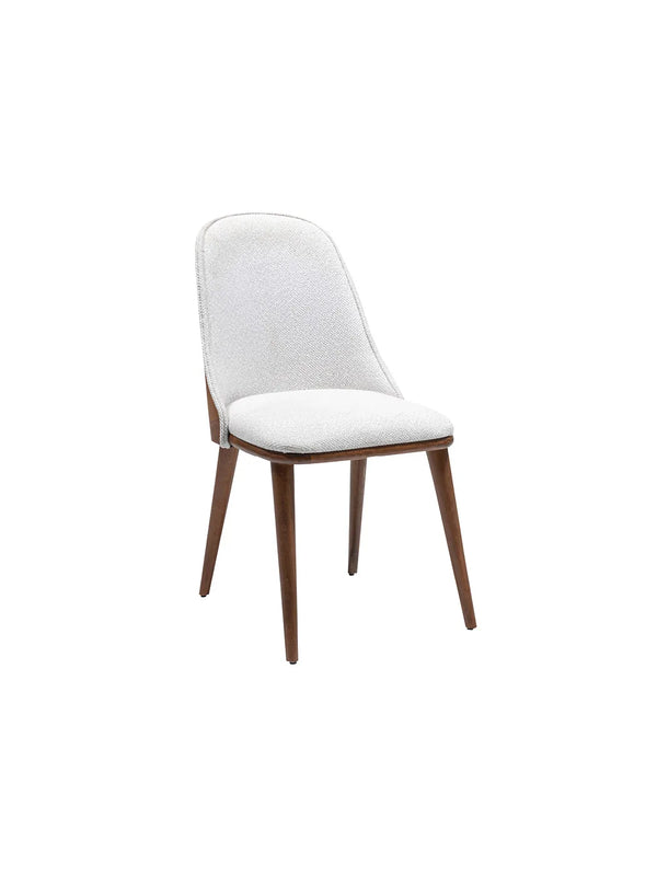 Sedia da pranzo Wood Crea in tessuto bianco con gambe in legno noce, vista di tre quarti